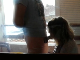 Public Blowjob on the Balcony – She doesn’t Care about Neigh